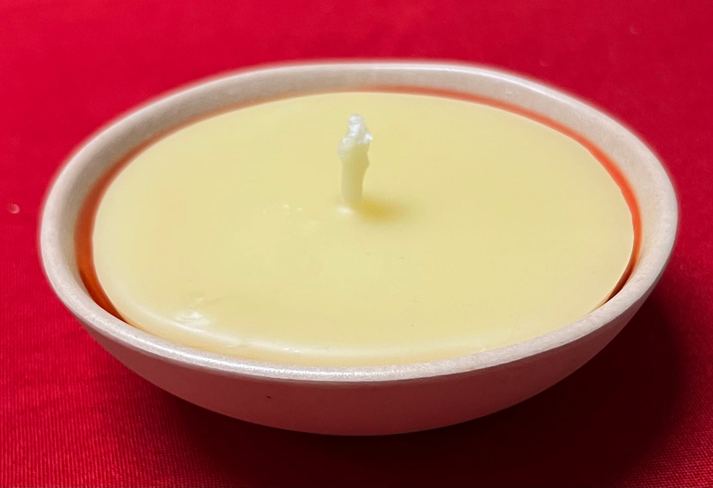 Small Soy Candle in a 4" wide Ceramic bowl.