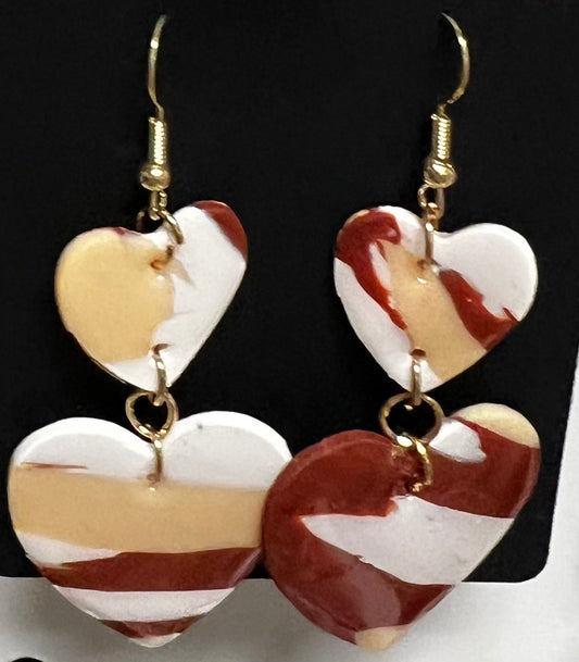 White, brown and tan Collection hanging